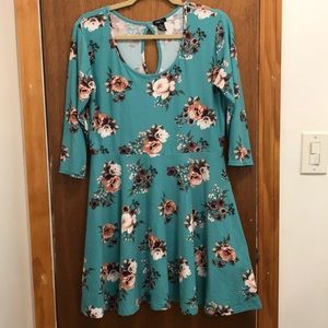 3/4 sleeve swing dress with keyhole back.